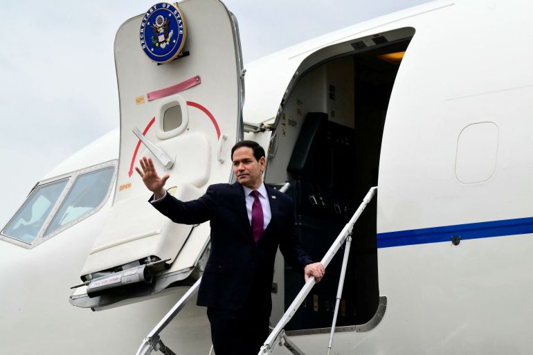 reuters_6a055509-1778734345 U.S. Secretary of State Marco Rubio waves as he boards his plane at the end of a visit to Italy and the Vatican, at Rome's Ciampino airport, Italy on May 8, 2026. STEFANO RELLANDINI/Pool via REUTERS