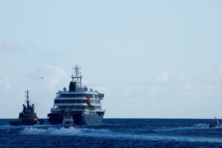 FILE PHOTO: The cruise ship MV Hondius, affected by a hantavirus outbreak, leaves the port of Granadilla de Abona, Tenerife, Spain May 11, TPX IMAGES OF THE DAY/File Photo