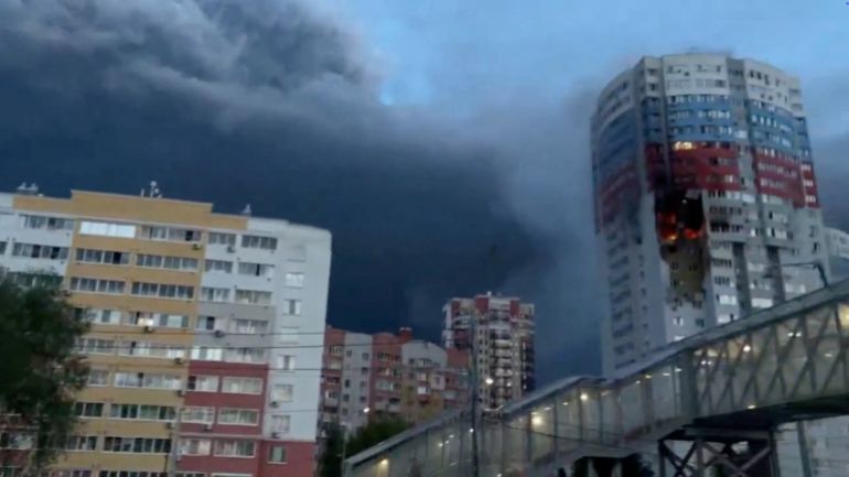 A plume of smoke rises next to a burning building, following a Ukrainian drone attack, amid the Russia-Ukraine conflict, in Ryazan, Ryazan region, Russia, May 15, 2026, in this screen grab obtained from a social media video. Social Media/via REUTERS THIS IMAGE HAS BEEN SUPPLIED BY A THIRD PARTY. MANDATORY CREDIT. NO RESALES. NO ARCHIVES. NEWS USE ONLY. VERIFICATION: - Buildings and road layout matched archive and satellite imagery. - Exact time when the video filmed not verified but regional Governor Pavel Malkov early on Friday (May 15) said a Ukrainian drone attack killed three people in the central Russian city of Ryazan, damaged high-rise apartment buildings and hit an industrial enterprise. - No older version of the video was found posted online before Friday.