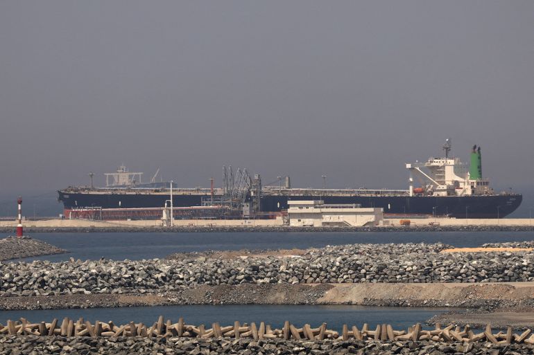 FILE PHOTO: A cargo ship docked at the Port of Fujairah, as the U.S.-Israel conflict with Iran limits marine traffic in the Strait of Hormuz, in Fujairah, United Arab Emirates, May 6, 2026. REUTERS/Amr Alfiky/File Photo