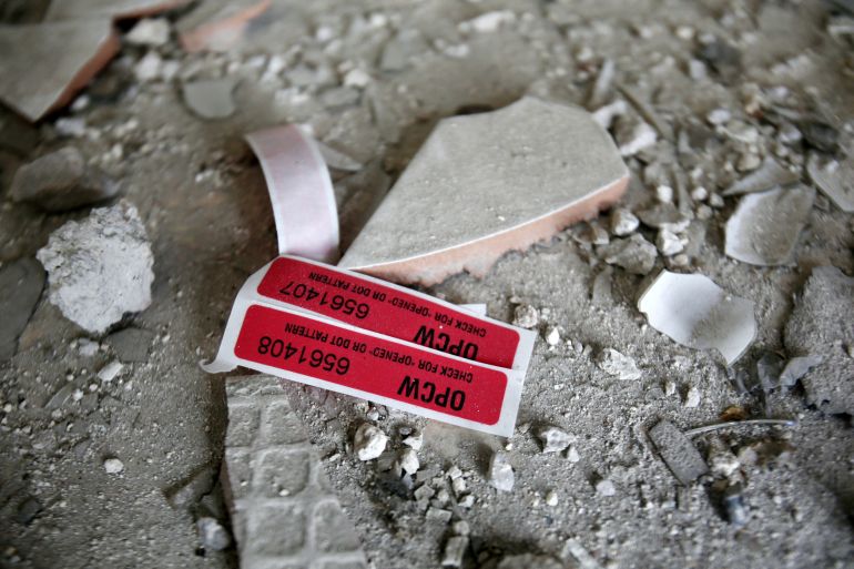 FILE PHOTO: Labels of the Organisation for the Prohibition of Chemical Weapons (OPCW) are seen iside a damaged house in Douma in Damascus, Syria April 23, 2018. REUTERS/ Ali Hashisho/File Photo