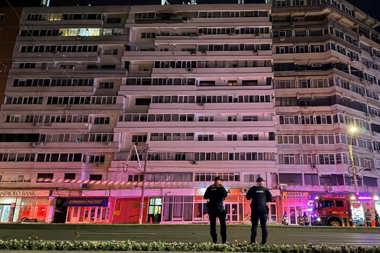 Firefighters and law enforcement work on the site of an explosion at a residential block of flats following a drone hit close to the border with Ukraine, in Galati, Romania, May 29, 2026. Inquam Photos via REUTERS ATTENTION EDITORS - THIS IMAGE WAS PROVIDED BY A THIRD PARTY. ROMANIA OUT. NO COMMERCIAL OR EDITORIAL SALES IN ROMANIA VISUAL EFFECT CAUSED BY PHOTO TAKEN WITH A LONG EXPOSURE. REFILE - ADDING EXPLANATION FOR VISUAL EFFECT
