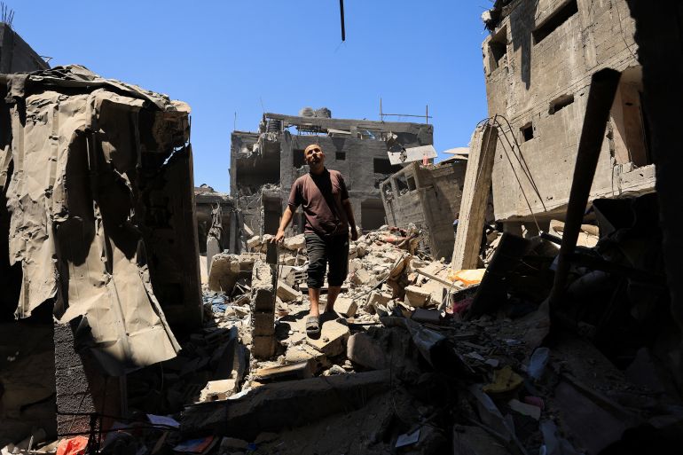 Palestinian Deya Al-Emrani inspects his house which was damaged in an Israeli strike that was pre-warned by the Israeli military to evacuate, before the strike was carried out late on Thursday at Shati (Beach) refugee camp, in Gaza City, May 29, 2026. REUTERS/Dawoud Abu Alkas