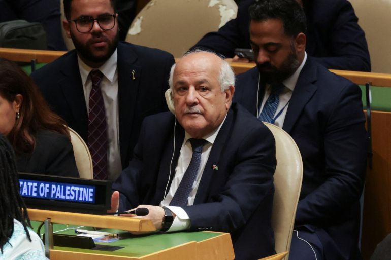 Palestinian Ambassador to the United Nations Riyad Mansour listens to U.S. President Donald Trump (not pictured) speak during the 80th United Nations General Assembly, in New York City, New York, U.S., September 23, 2025. REUTERS/Jeenah Moon