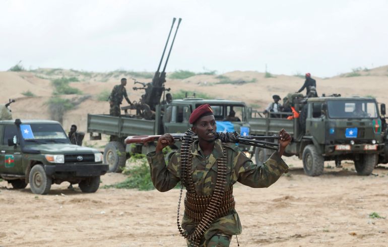 rtxc3g4k A Somali military opposition soldier from Hawiye clan is seen as they move to their barracks after reaching an agreement with the prime minister following clashes over the tenure of the president in Mogadishu