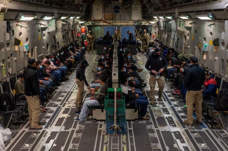 TUCSON, AZ - JANUARY 23: (EDITOR'S NOTE: This Handout image was provided by a third-party organization and may not adhere to Getty Images' editorial policy.) In this handout provided by the U.S. Department of Defense, illegal immigrants await takeoff for a removal flight at the Tucson International Airport, Ariz., Jan. 23, 2025. Under the direction of U.S. Northern Command, U.S. Transportation Command is supporting Immigration and Customs Enforcement removal flights by providing military airlift. (Dept. of Defense photo by Senior Airman Devlin Bishop)