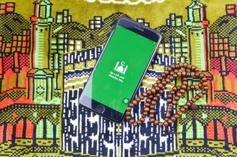 shutterstock_1442927096-1778919450 Puchong, Malaysia - July 05, 2019; Flatlay concept for Muslim Pro icon apps for muslim. Very popular apps for reading quran, performing pray or "solah" and qibla direction. Best islamic apps in 2019.