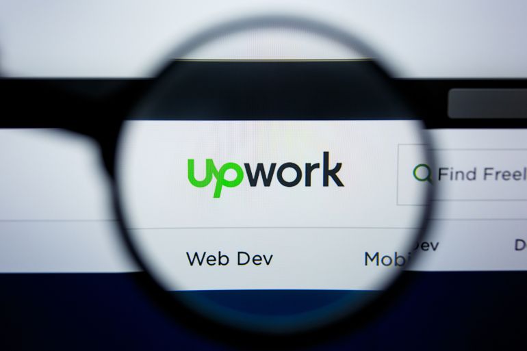 shutterstock_1466142731-1779798358 Los Angeles, California, USA - 29 Jule 2019: Illustrative Editorial of UPWORK.COM website homepage. UP WORK logo visible on display screen.