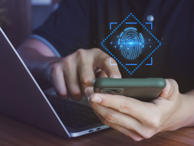 shutterstock_2298029375-1778414782 Scan your fingerprint for biometric authentication. to access transactions within the smartphone, focus on the finger