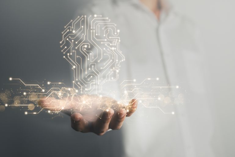 Business man and robot hand touch digital screen of AI icon artificial intelligence concept, big data, science, innovation technology, cloud computing, futuristic, internet network communication