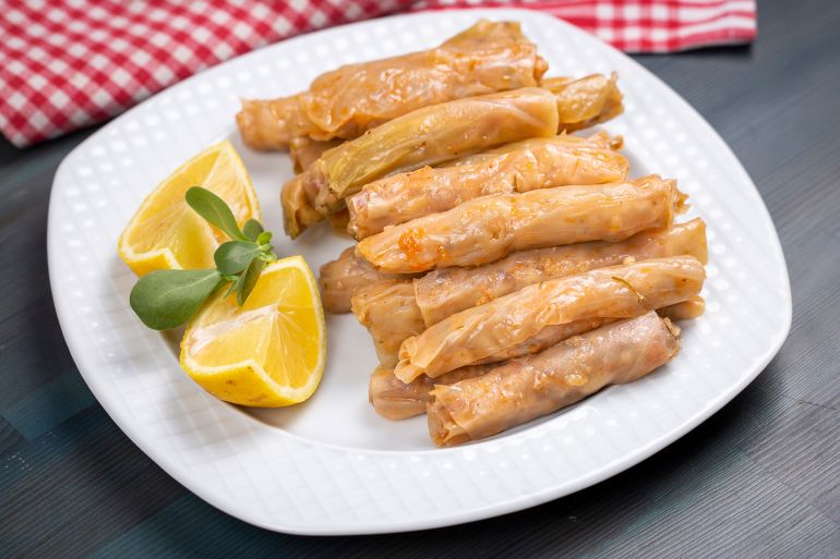 Lahana Sarma - Lahana sarmasi, Turkish traditional food,a boiled cabbage leaf that is formed into a roll with a stuffing of rice; Shutterstock ID 2330664109; purchase_order: aj; job: ; client: ; other: