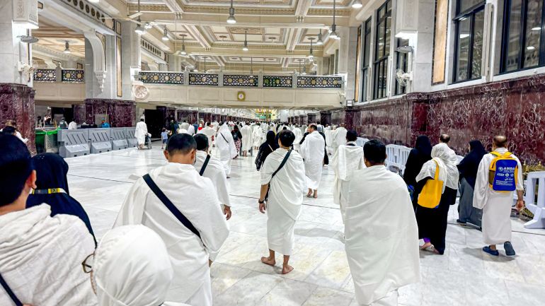 People are carrying out spiritual activities called sa'i or sai which is one of a series of Umrah and Hajj on Safa and Marwa Hills at night. Mecca, Saudi Arabia. May 24, 2024