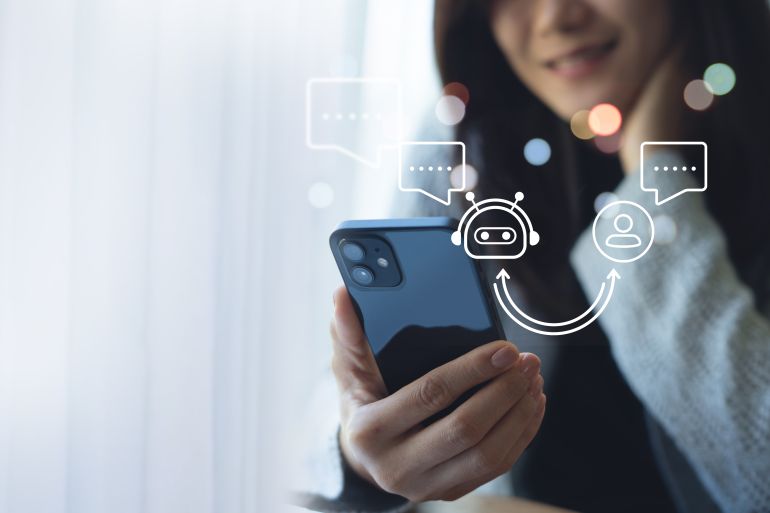Digital AI chatbot coversation assistant, artificial intelligence technology, Happy young Asian woman using mobile smartphone with AI chatbot for online information, internet bot automatic answering