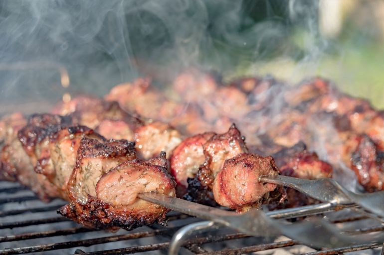 Shish kebab. ork meat threaded onto skewers and grilled.
