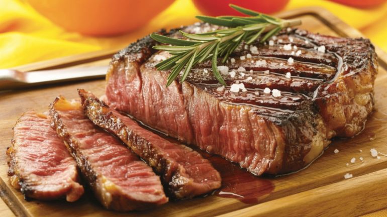 shutterstock_2729776843-1779200734 Beef Steak: savory, dinner, beef, bbq, main course, sirloin, meat, gourmet, protein, medium rare, steakhouse, juicy, seared, delicious, ribeye, grilled beef, quality, best, dish, photo