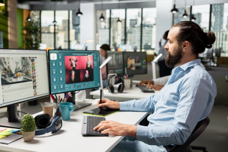 Male worker using AI generative models for text to image editorial materials, virtual assistant writing script for photography generating next to video streaming platform on dual monitors.