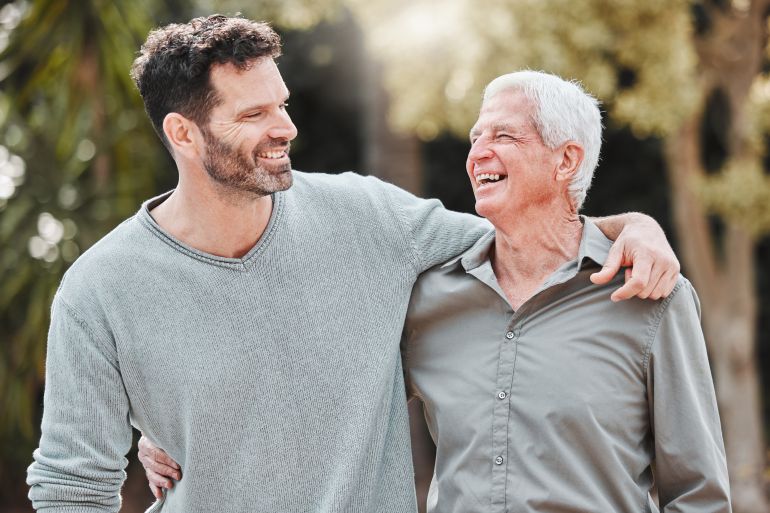 Laugh, man and senior dad in garden with hug, fun smile and care in outdoor bonding together in nature. Love, elderly father and adult son in backyard with embrace, support and happy family in park; Shutterstock ID 2491350447; purchase_order: d; job: ; client: ; other: