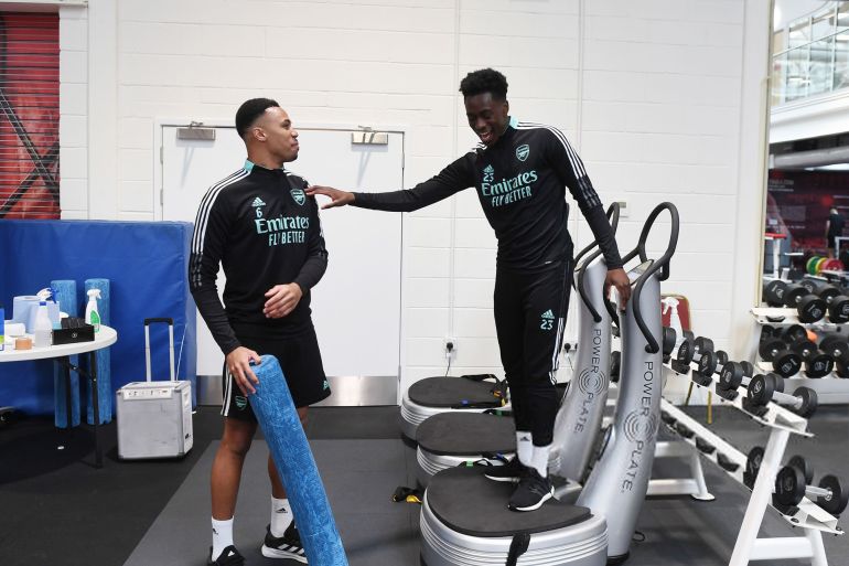 12656-1780896912 ST ALBANS, ENGLAND - MARCH 05: (L-R) Gabriel and Sambi of Arsenal during a training session at London Colney on March 05, 2022 in St Albans, England. (Photo by Stuart MacFarlane/Arsenal FC via Getty Images)