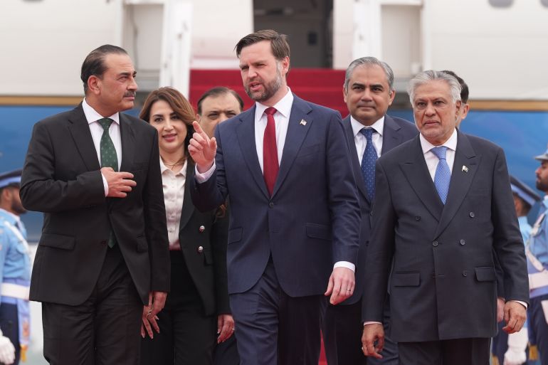 18676874-1781852461-1 ISLAMABAD, PAKISTAN - APRIL 11: U.S. Vice President JD Vance (C) walks with Pakistan's Chief of Defence Forces and Chief of Army Staff Field Marshall Asim Munir (L), and Pakistani Deputy Prime Minister and Foreign Minister Mohammad Ishaq Dar after arriving for talks with Iranian officials on April 11, 2026 at Islamabad, Pakistan. The proposed meeting marks a rare direct engagement between senior U.S. and Iranian officials, as Washington and Tehran seek to advance stalled negotiations over Iran's nuclear programme, with Pakistan serving as neutral ground amid persistent tensions between the two countries. (Photo by Jacquelyn Martin - Pool/Getty Images)