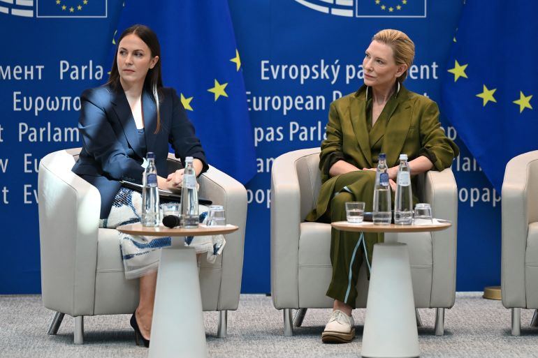 EU Parliament Member Eva Maydell (L) and Australian actress and producer Cate Blanchett listen to a speech during the launch of the "RSL Media Human Consent Registry to Protect Identity in the Age of AI", at the EU Parliament in Brussels on June 23, 2026. (Photo by Nicolas TUCAT / AFP)