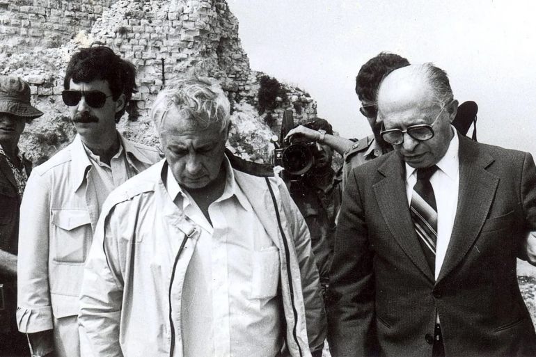 32v32v-1780311356 Prime minister Menachem Begin (right) and defense minister Ariel Sharon on June 7, 1982 at Beaufort Castle, a few hours after Israeli troops captured the Palestinian stronghold in Southern Lebanon. (AP Photo)