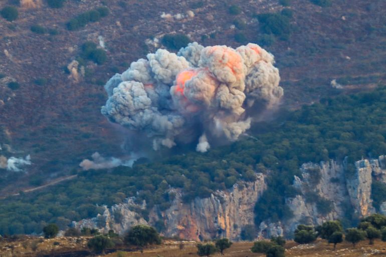 492-1781868732 TOPSHOT - Smoke billows from the site of an Israeli airstrike in Marjayoun, near the Lebanon-Israel border, on September 23, 2024. The Israeli military on September 23 told people in Lebanon to move away from Hezbollah targets and vowed to carry out more "extensive and precise" strikes against the Iran-backed group. (Photo by Rabih DAHER / AFP) (Photo by RABIH DAHER/AFP via Getty Images)
