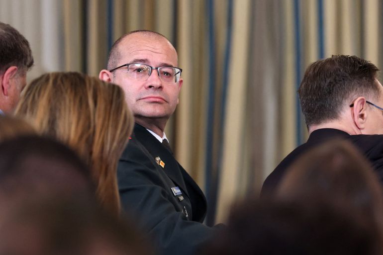 54-1782111098 Israel's Military Secretary to the Prime Minister Roman Gofman waits before a joint press conference of U.S. President Donald Trump and Israeli Prime Minister Benjamin Netanyahu in the State Dining Room at the White House, in Washington, D.C., U.S., September 29, 2025. REUTERS/Jonathan Ernst