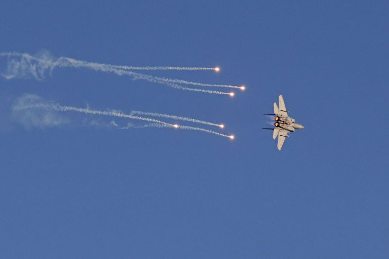 56d981d8a8d984-1772267671 A F-15 fighter jet takes part in an aerial display during the graduation ceremony of Israeli air force pilots at the Hatzerim base in the Negev desert, on June 23, 2022. (Photo by Menahem KAHANA / AFP) (Photo by MENAHEM KAHANA/AFP via Getty Images)