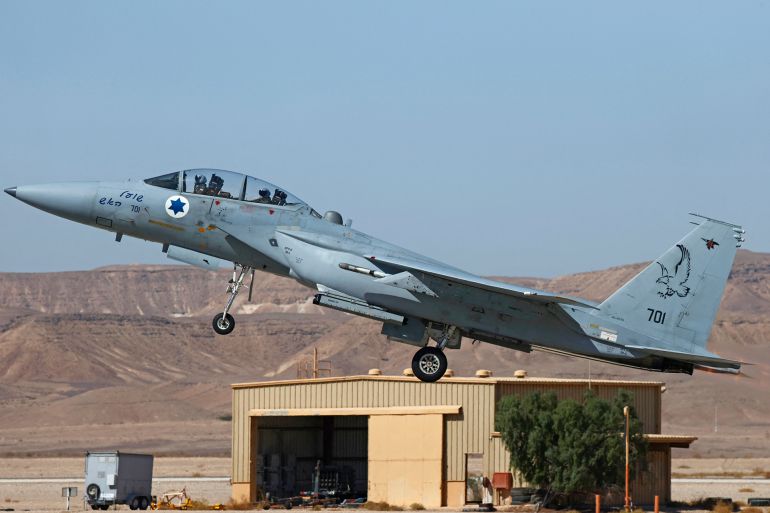 An Israeli air force F-15 fighter takes off during the "Blue Flag" multinational air defence exercise at the Ovda air force base, north of the Israeli city of Eilat, on October 24, 2021. Israel is holding its largest-ever air force exercise this week, joined by several Western countries and India, with the United Arab Emirates air force chief visiting the drills. (Photo by JACK GUEZ / AFP)