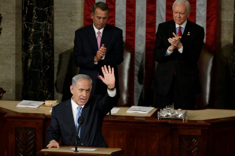 Israeli Prime Minister Benjamin Netanyahu (L) acknowledges applause at the end of his speech to a joint meeting of Congress in the House Chamber on Capitol Hill in Washington, March 3, 2015. U.S. Speaker of the House John Boehner (C) (R-OH) and President pro tempore of the U.S. Senate Orrin Hatch (R-UT) applaud behind Netanyahu. REUTERS/Gary Cameron (UNITED STATES - Tags: POLITICS)