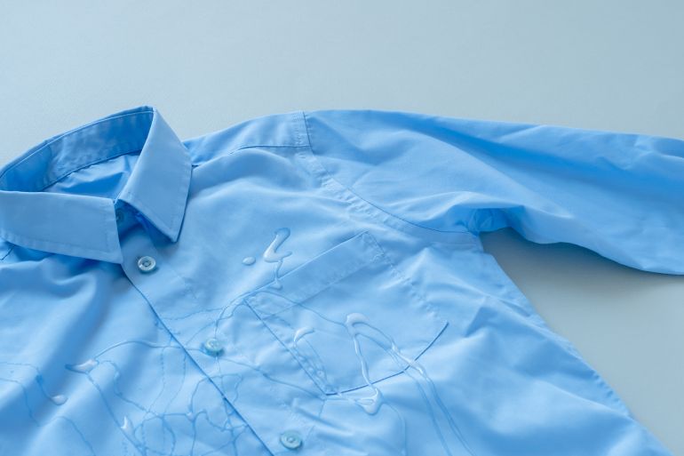 spilled glue on the shirt by HalynaRom @ادوبي ستوك