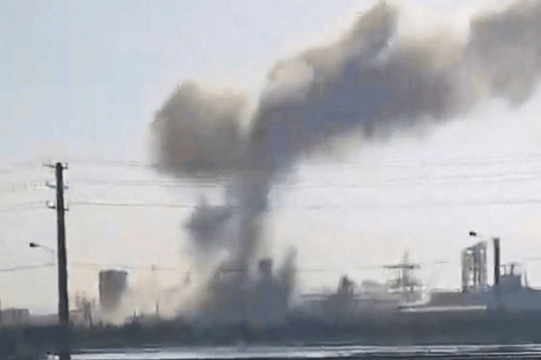 8465-1780941564 Smoke rises near the Mahshahr petrochemical complex after a reported Israeli attack, Near Bandar Imam Khomeini, Khuzestan Province, Iran June 8, 2026, in this screengrab obtained from a social media video. SOCIAL MEDIA/via REUTERS THIS IMAGE HAS BEEN SUPPLIED BY A THIRD PARTY. NO RESALES. NO ARCHIVES. VERIFICATION: - Utility poles, railway, road layout, and wall matched satellite imagery - Date confirmed from Iranian and Israeli confirmations of the petrochemical complex being hit - Israel said on June 8 it struck targets at the Mahshahr petrochemical complex, Iranian revolutionary guards said they’re conducting retaliatory strikes for the complex being hit while a provincial official told Iran's semi-official Fars news agency parts of the plant were damaged. - No older version of the video was found posted online before June 8