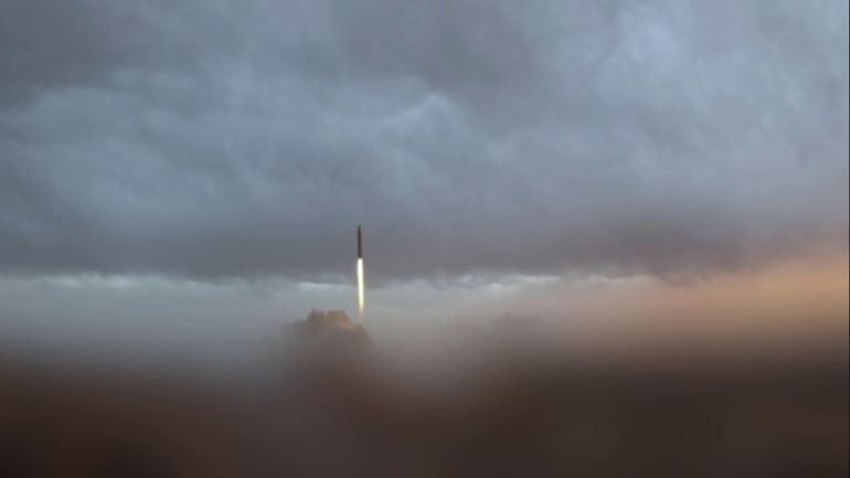 afp_69b33f88b8c5-1773354888 This video grab taken from handout footage released by the Iranian Revolutionary Guard Corps (IRGC) on March 12, 2026, shows what it says was the "launch of wave #41 of Iranian missiles".