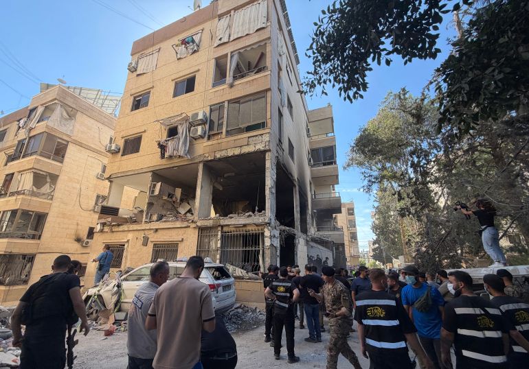 Rescue workers and local residents inspect the damage to a building following an Israeli air strike in the Choueifat area, south of Beirut on the outskirts of the capital’s southern suburbs, on May 28, 2026.