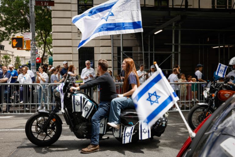 Participants ride along Fifth Avenue during the Israel Day Parade in New York, on May 31, 2026.