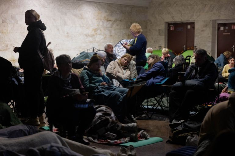 People take shelter at a metro station during an air alarm in Kyiv on June 2, 2026, amid the Russian invasion of Ukraine.