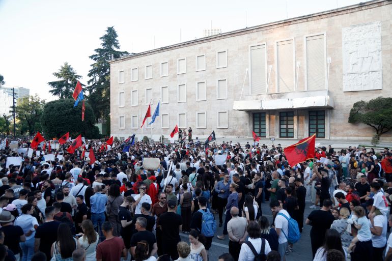 Protestors take part in a demonstration in front of the prime minister's office, against the construction of a luxury resort near a protected natural area, in Tirana on June 2, 2026.