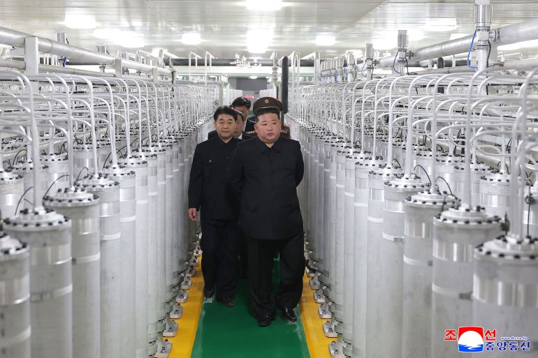 afp_6a20c67bcb38-1780532859 This picture taken on June 3, 2026 and released by North Korea's official Korean Central News Agency (KCNA) on June 4, 2026 shows North Korean leader Kim Jong Un (front R) inspecting the newly-inaugurated nuclear materials production factory at an undisclosed location in North Korea.