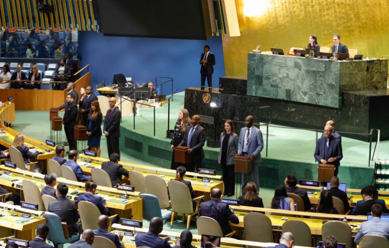 Usher hold ballot boxes during an UN General Assembly meeting for the election of the non-permanent members of the UN Security Council at the UN headquarters in New York City on June 3, 2026.