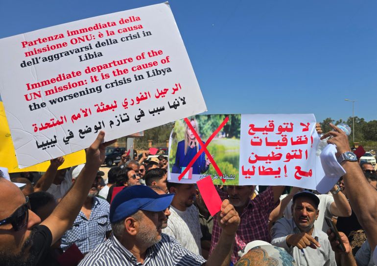 Libyans take part in a demonstration in front of the UNHCR office in Tripoli on June 4, 2026, demanding the departure and closure of the UNHCR offices and declaring 'No to foreign settlement in Libya'.