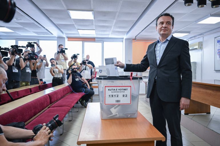 afp_6a25c064ba83-1780858980 Kosovo's Prime Minister Albin Kurti casts his ballot at a polling station on the day of general elections in Pristina on June 7, 2026.