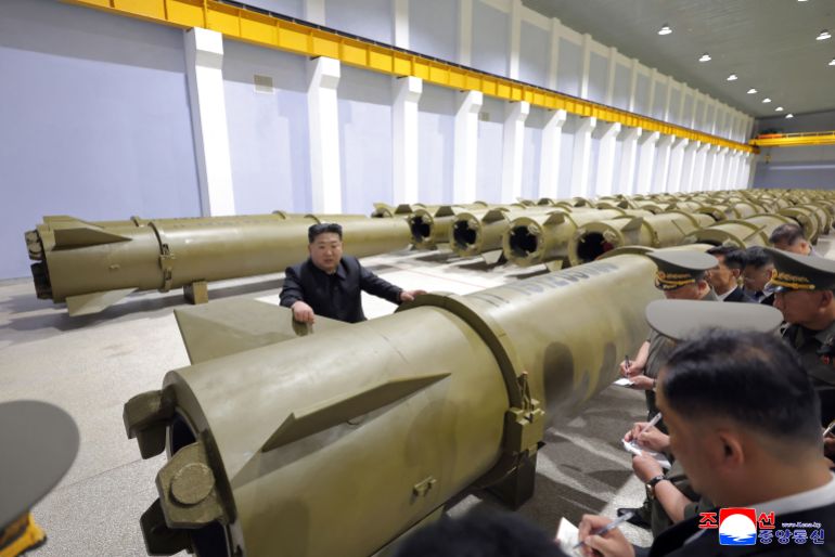 afp_6a265a95834c-1780898453 This handout photograph taken on June 6, 2026 and released by North Korea's official Korean Central News Agency (KCNA) on June 7, 2026 shows North Korean leader Kim Jong Un visiting a military-industrial factory to inspect the production in an undisclosed location.