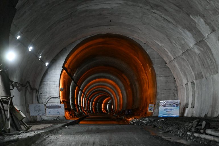 afp_6a281bac8184-1781013420 Lights illuminate the Zojila tunnel, India's longest road tunnel project connecting Jammu and Kashmir with the Ladakh region, in Minamarg on June 9, 2026.