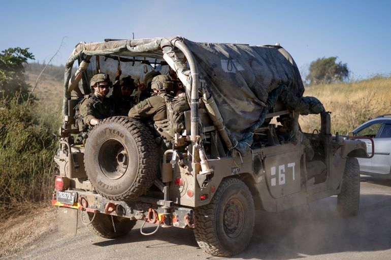 afp_6a2923cba190-1781081035 An Israeli army humvee vehicle patrols along the northern road near Moshav Margaliot in the Upper Galilee bordering Lebanon on June 9, 2026, after a shooting incident at IDF soldiers operating in the Ramim Ridge area.