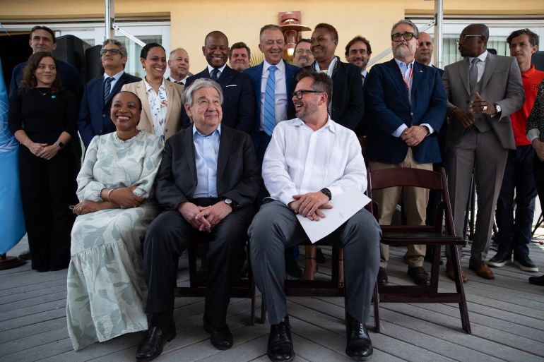 afp_6a3234e77ab0-1781675239 United Nations Secretary-General Antonio Guterres (C) poses with UN representatives in the Petion-Ville commune of Port-au-Prince, Haiti, on June 16, 2026.