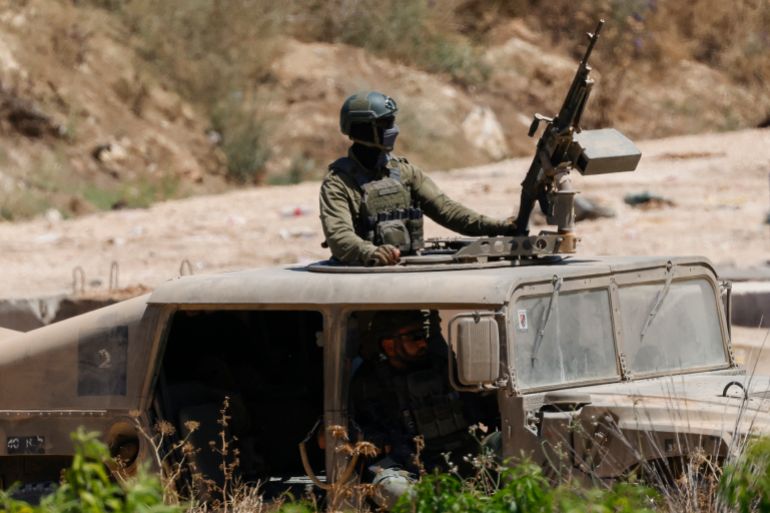An Israeli army humvee vehicle patrols along the northern region in the Upper Galilee bordering Lebanon on June 18, 2026.