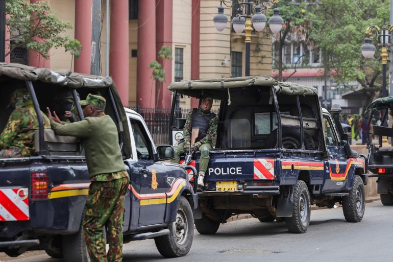 Anti-riot police arrive in a convoy of police trucks to secure select locations of the Central Business District (CBD) ahead of demonstrations planned to mark the second anniversary of the deadly June 2024 youth-led anti-Finance Bill protests, which saw demonstrators storm Parliament, in Nairobi on June 25, 2026.