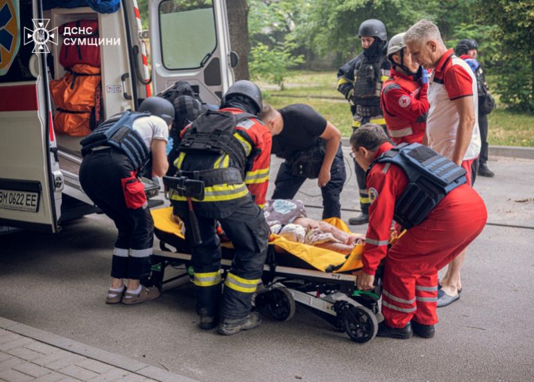 This handout photograph taken and released by the State Emergency Service of Ukraine on June 27, 2026, shows firefighters and paramedics evacuating a wounded person from a damaged residential building following a Russian strike in Sumy, amid the Russian invasion of Ukraine. (Photo by Handout / State Emergency Service of Ukraine / AFP) / RESTRICTED TO EDITORIAL USE - MANDATORY CREDIT "AFP PHOTO / STATE EMERGENCY SERVICE OF UKRAINE" - HANDOUT - NO MARKETING NO ADVERTISING CAMPAIGNS - DISTRIBUTED AS A SERVICE TO CLIENTS