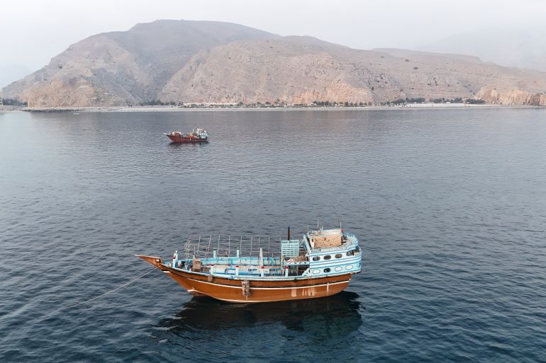 This aerial photograph shows boats anchored off Oman’s northern Musandam Peninsula near the Strait of Hormuz on June 27, 2026.