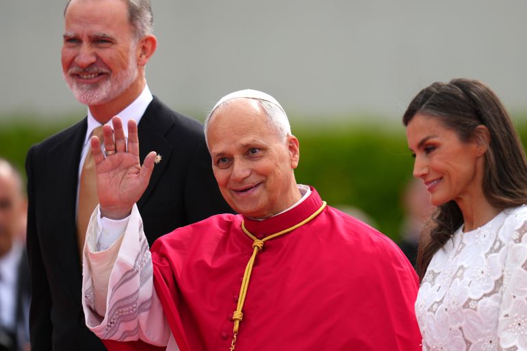Pope Leo XIV next to King Felipe and Queen Letizia arrives at Adolfo Suarez-Madrid Barajas Airport in Madrid, Spain, Saturday, June 6, 2026, at the start of a seven-day pastoral visit to mainland Spain and the Canary Islands. (AP Photo/Manu Fernandez)